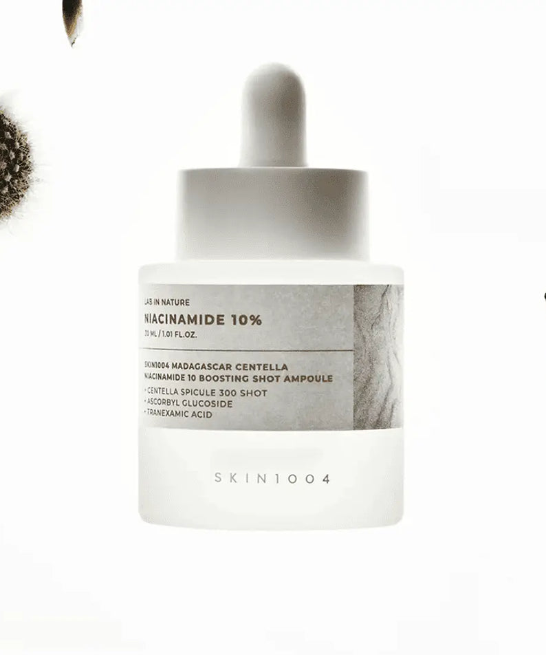 SKIN1004 Madagascar Centella Niacinamide 10 Boosting Shot Ampoule 30ml with dropper and natural background