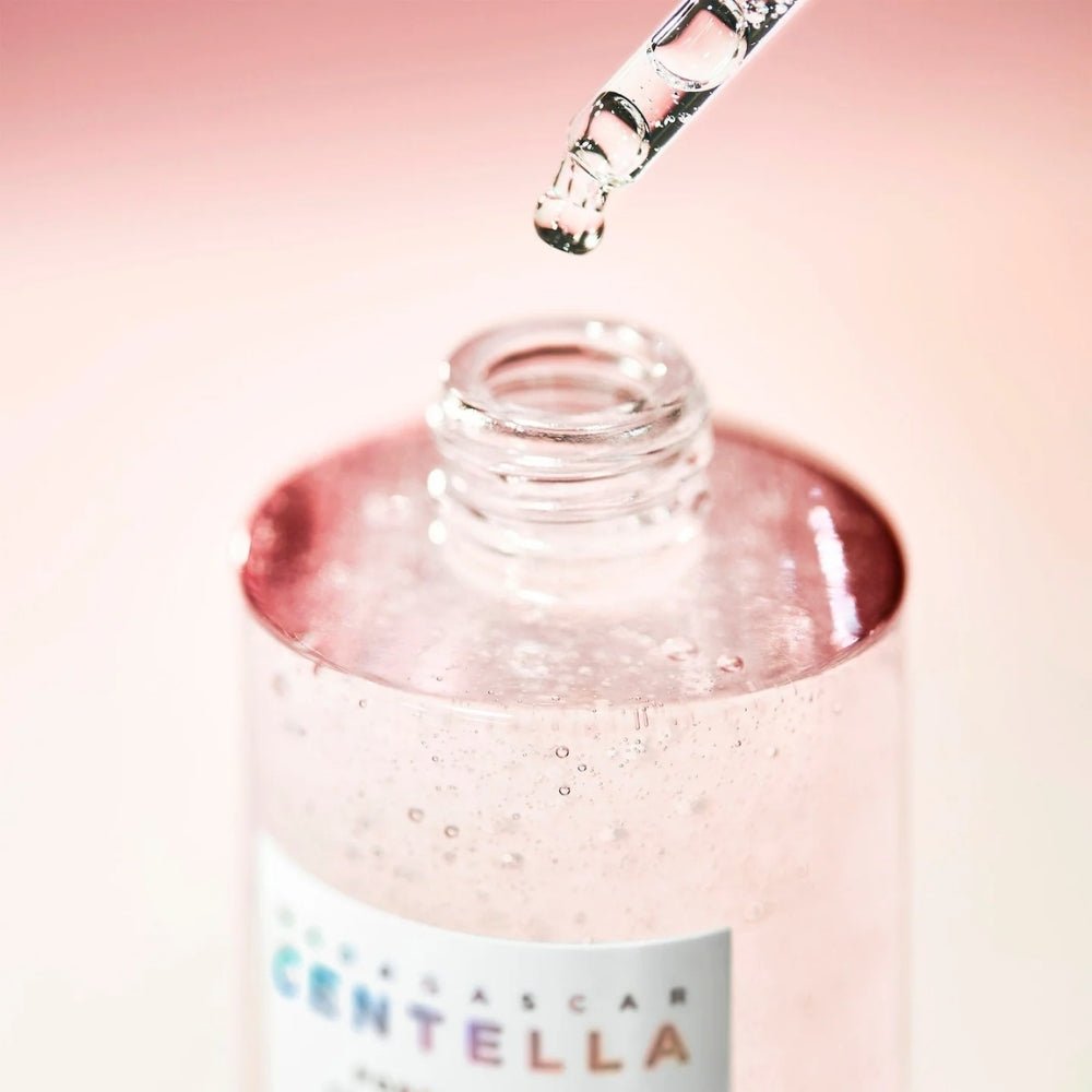 SKIN1004 Madagascar Centella Pore-Mfying Fresh Ampoule 100ml bottle with dropper, highlighting product texture and packaging.