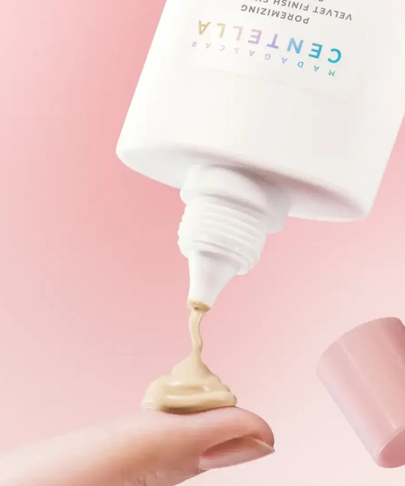 SKIN1004 Madagascar Centella Poreizing Velvet Finish Sunscreen 50ml being applied to finger