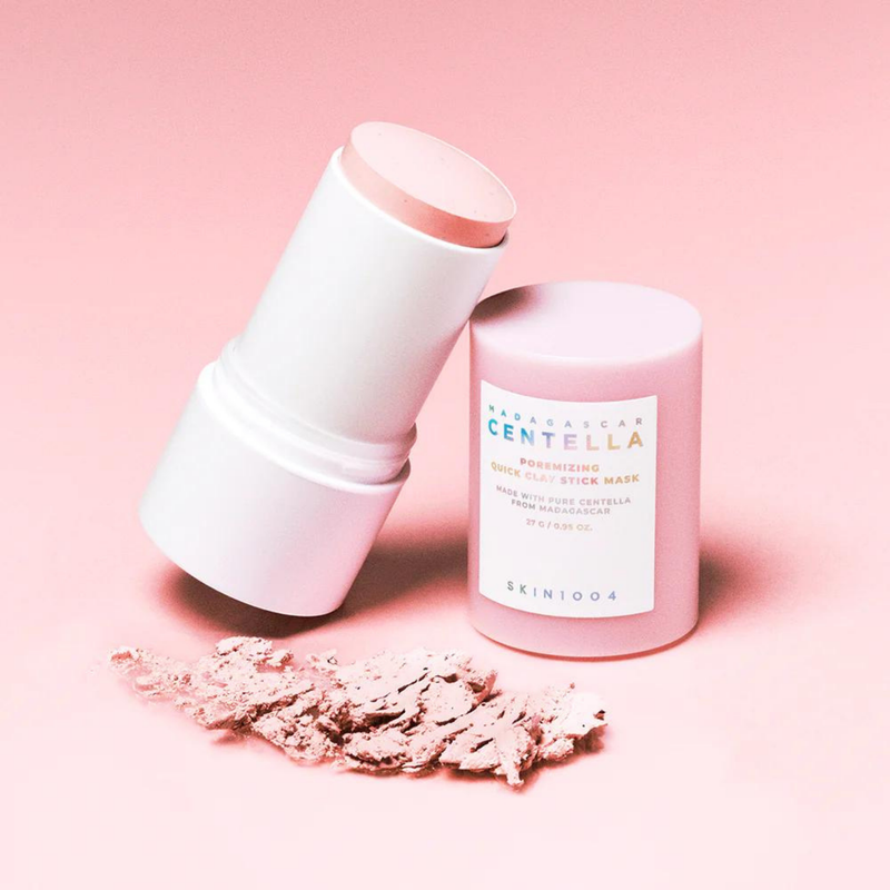 SKIN1004 Madagascar Centella Poremising Quick Clay Stick Mask 27g displayed on pink background