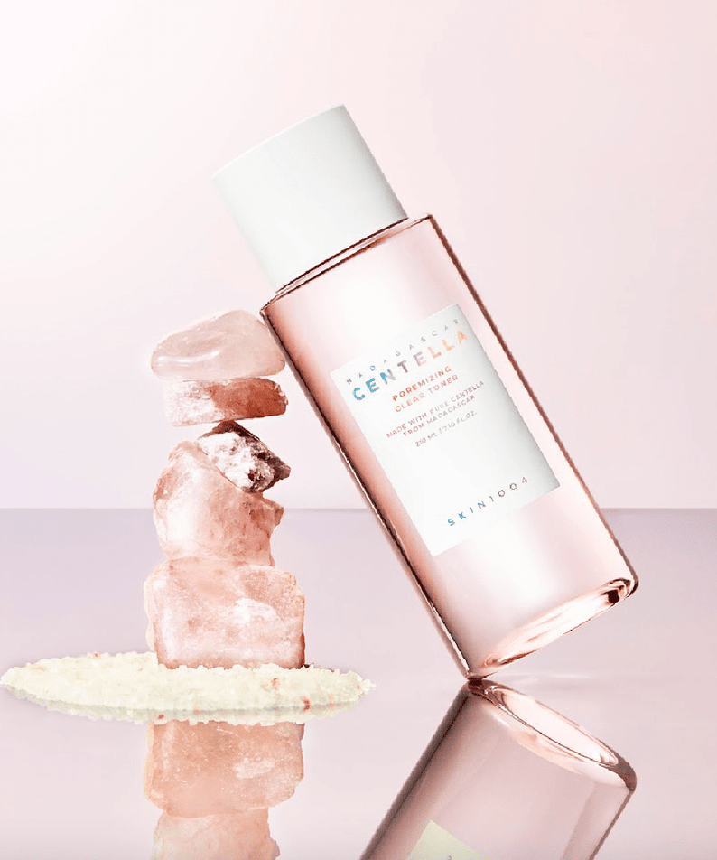 SKIN1004 Madagascar Centella Poremizing Clear Toner 210ml bottle with natural elements on pastel background