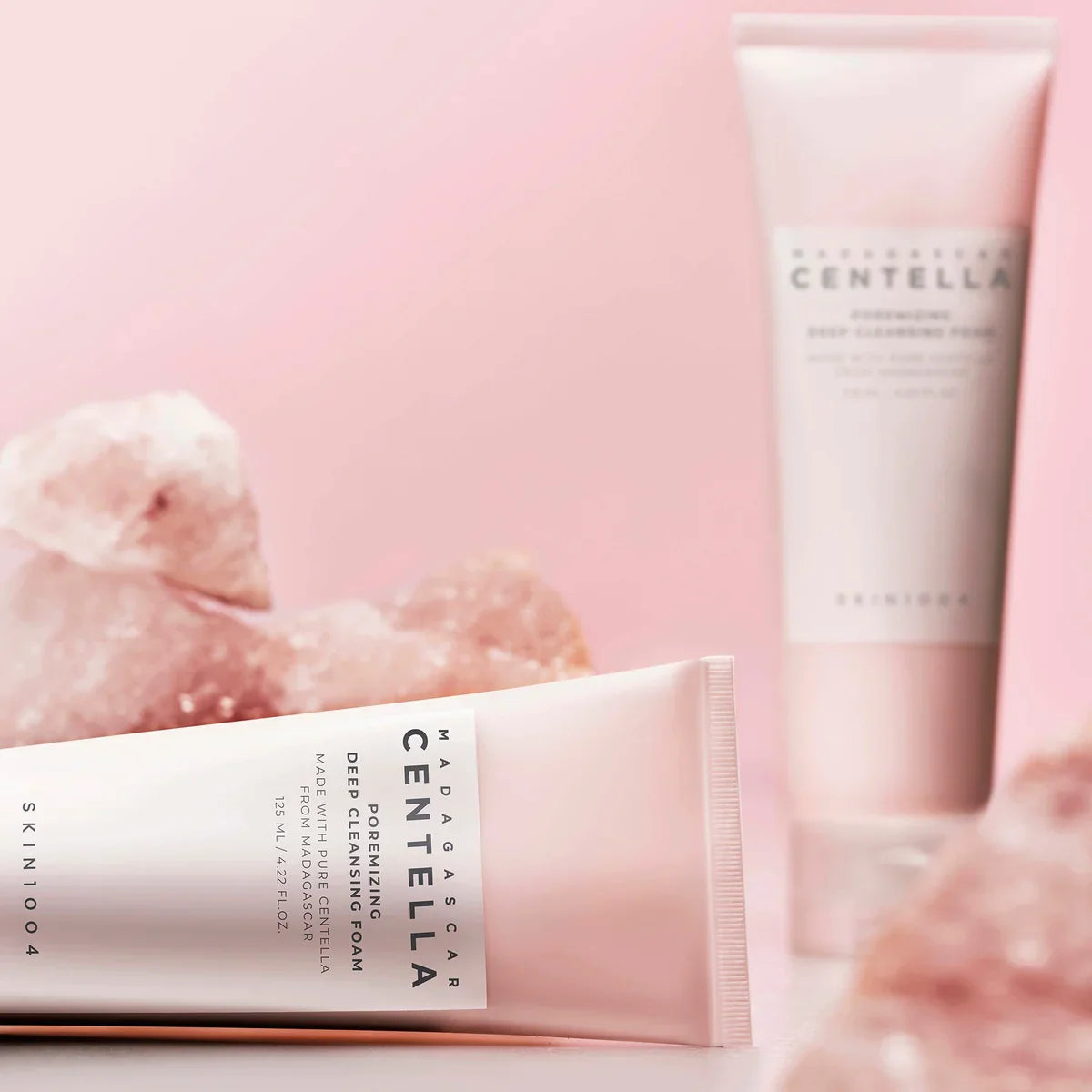 SKIN1004 Madagascar Centella Poremizing Deep Cleansing Foam 125ml product display with pink background and crystal accents.