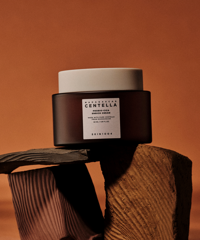 SKIN1004 Madagascar Centella Probio-cica Enrich Cream 50ml on textured brown background