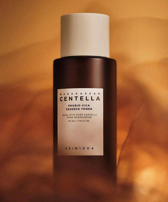 SKIN1004 Madagascar Centella Probio-cica Essence Toner 210ml bottle with rich background