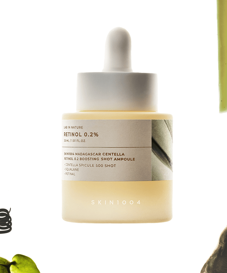 Image of SKIN1004 Madagascar Centella Retinol 0.2 Boosting Shot Ampoule 30ml with dropper, focused on skincare product design.