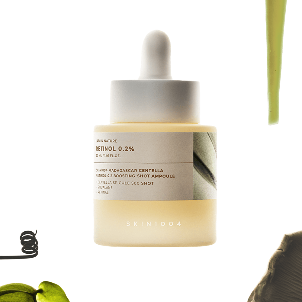 Image of SKIN1004 Madagascar Centella Retinol 0.2 Boosting Shot Ampoule 30ml with dropper, focused on skincare product design.