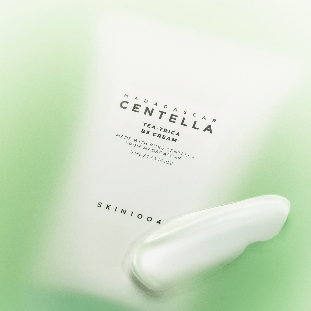 SKIN1004 Madagascar Centella Tea-trica B5 Cream 75ml tube on a green background