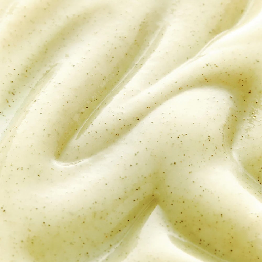 Texture of SKIN1004 Madagascar Centella Tea-trica Mild Peeling Gel 125ml showing creamy consistency and natural exfoliating particles.