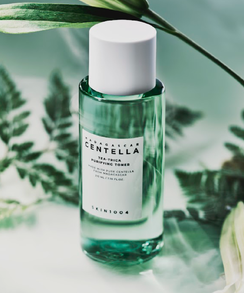 SKIN1004 Madagascar Centella Tea-trica Purifying Toner 210ml bottle displayed with green leaves
