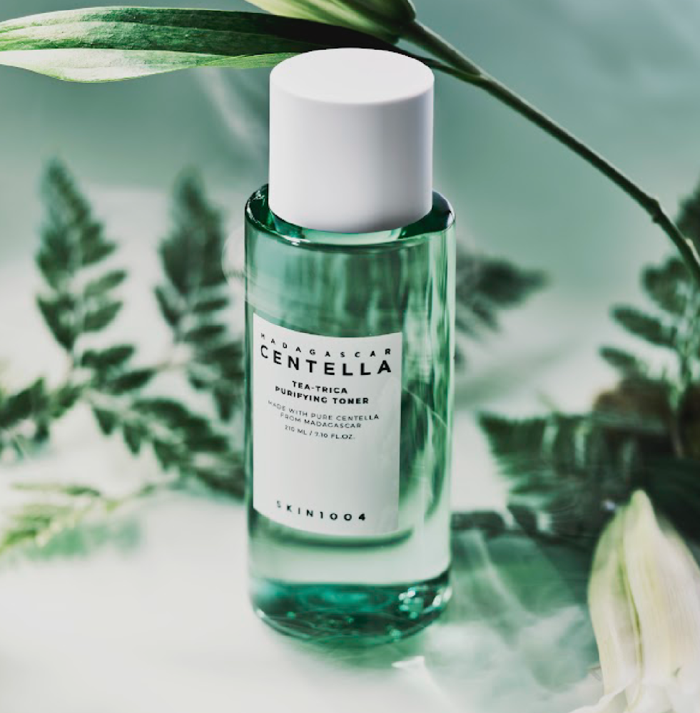 SKIN1004 Madagascar Centella Tea-trica Purifying Toner 210ml bottle displayed with green leaves