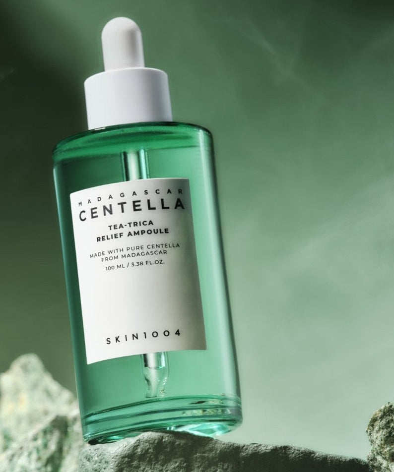 SKIN1004 Madagascar Centella Tea-trica Relief Ampoule 100ml bottle on a textured surface