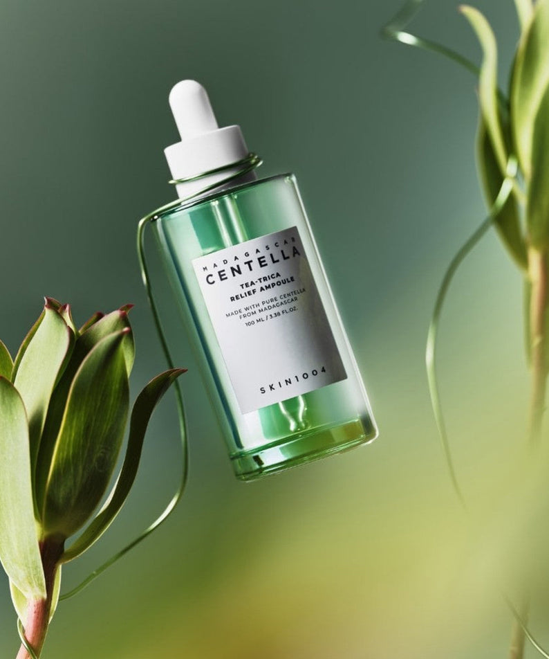 SKIN1004 Madagascar Centella Tea-trica Relief Ampoule 100ml glowing amongst greenery