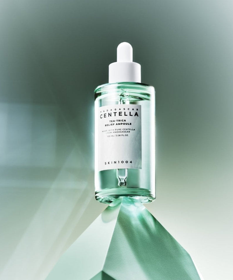 SKIN1004 Madagascar Centella Tea-trica Relief Ampoule 100ml bottle on a green pedestal