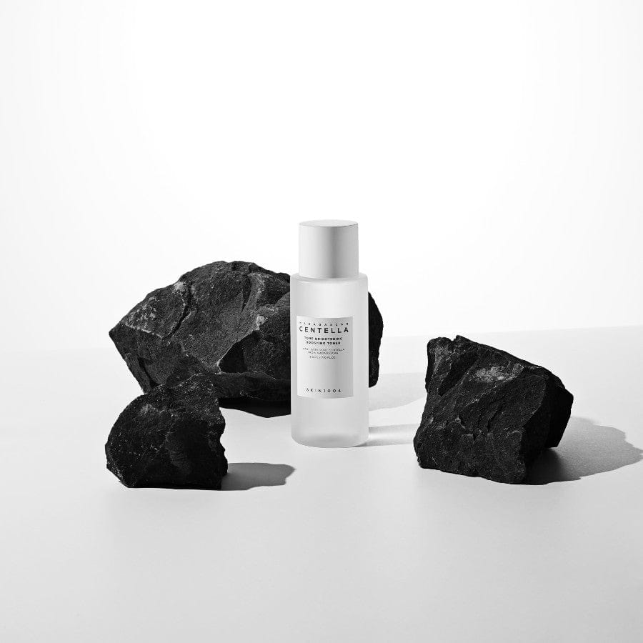 SKIN1004 Madagascar Centella Tone Brightening Boosting Toner 210ml bottle on display with rocks
