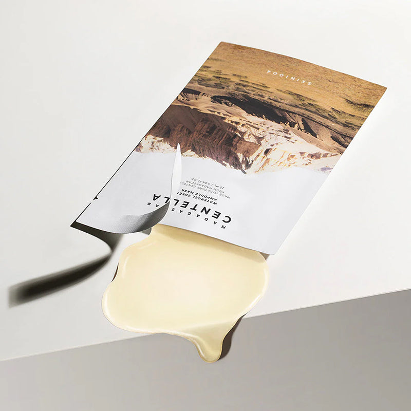 SKIN1004 Madagascar Centella Water Gel Sheet Ampoule Mask 25ml [5 sheets] on a white background with gel leaking from the package.