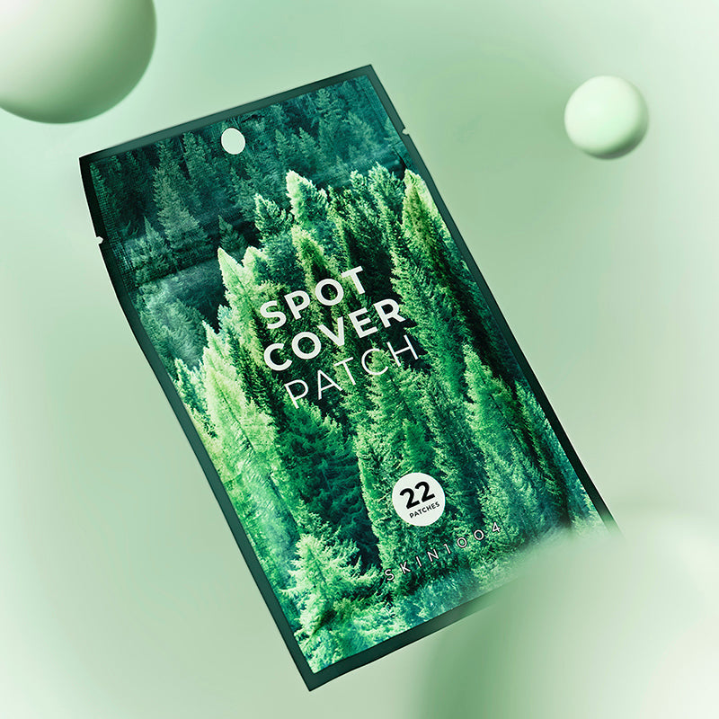 SKIN1004 Spot Cover Patch 22patch packaging design against green background.