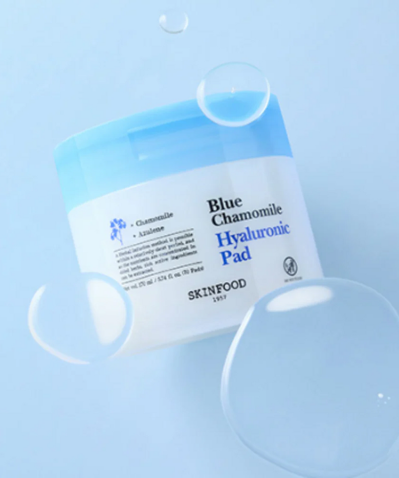 SKINFOOD Blue Chamomile Hyaluronic Gel Pads 70 Sheets on blue background with bubbles
