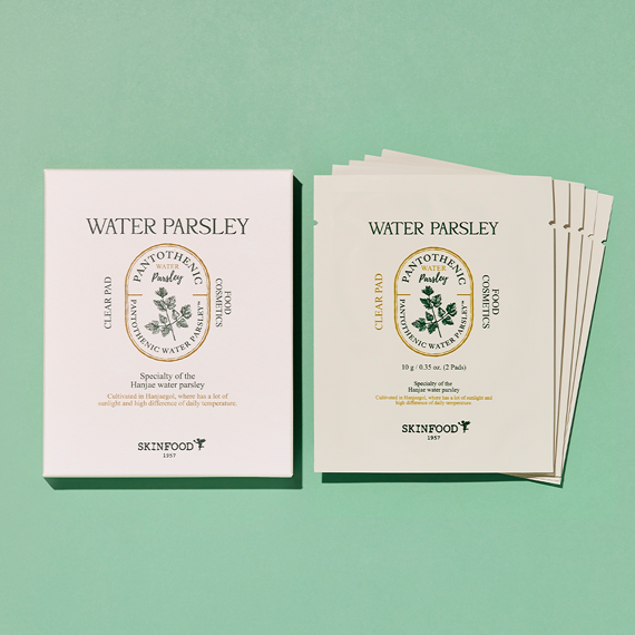 SKINFOOD Pantothenic Water Parsley Clear Pad packaging and individual clear pads on green background.
