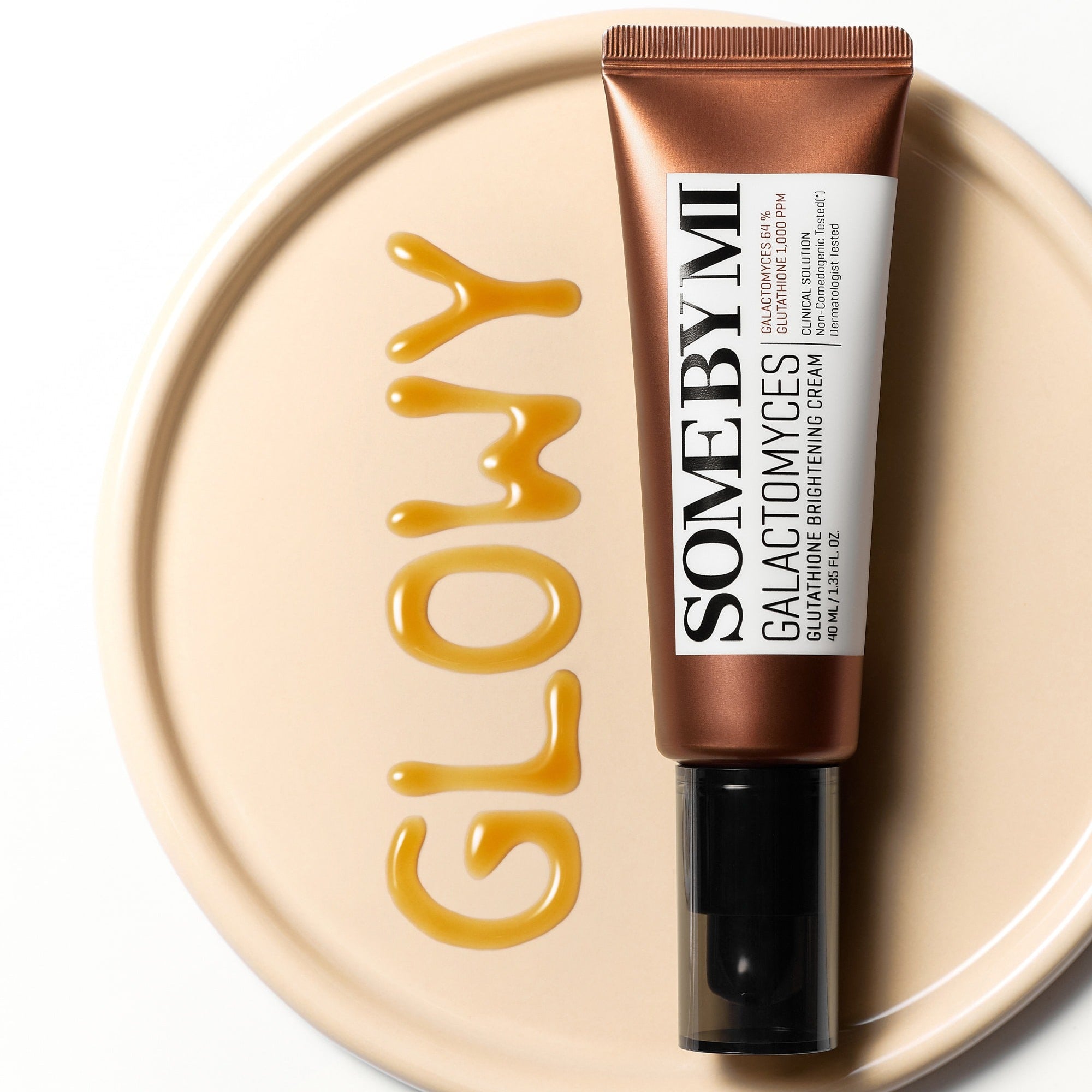 SOME BY MI Galactomyces Glutathione Brightening Cream 40ml on a beige surface with the word 'glowy' written in orange.