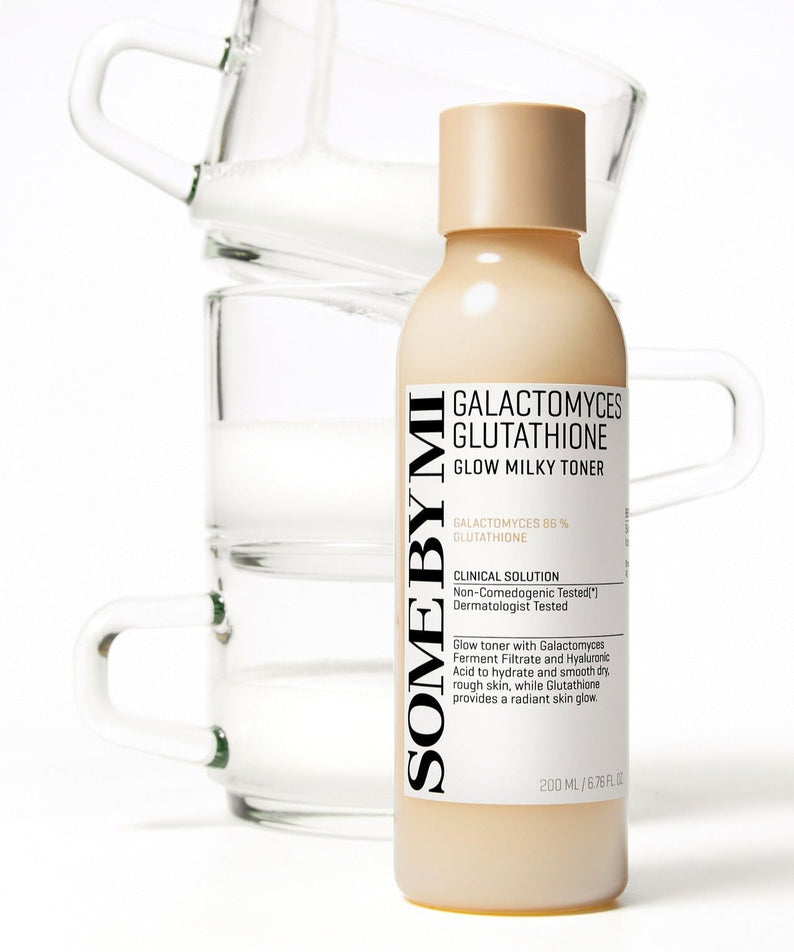 SOME BY MI Galactomyces Glutatione Glow Milky Toner 200ml bottle in front of stacked glass containers