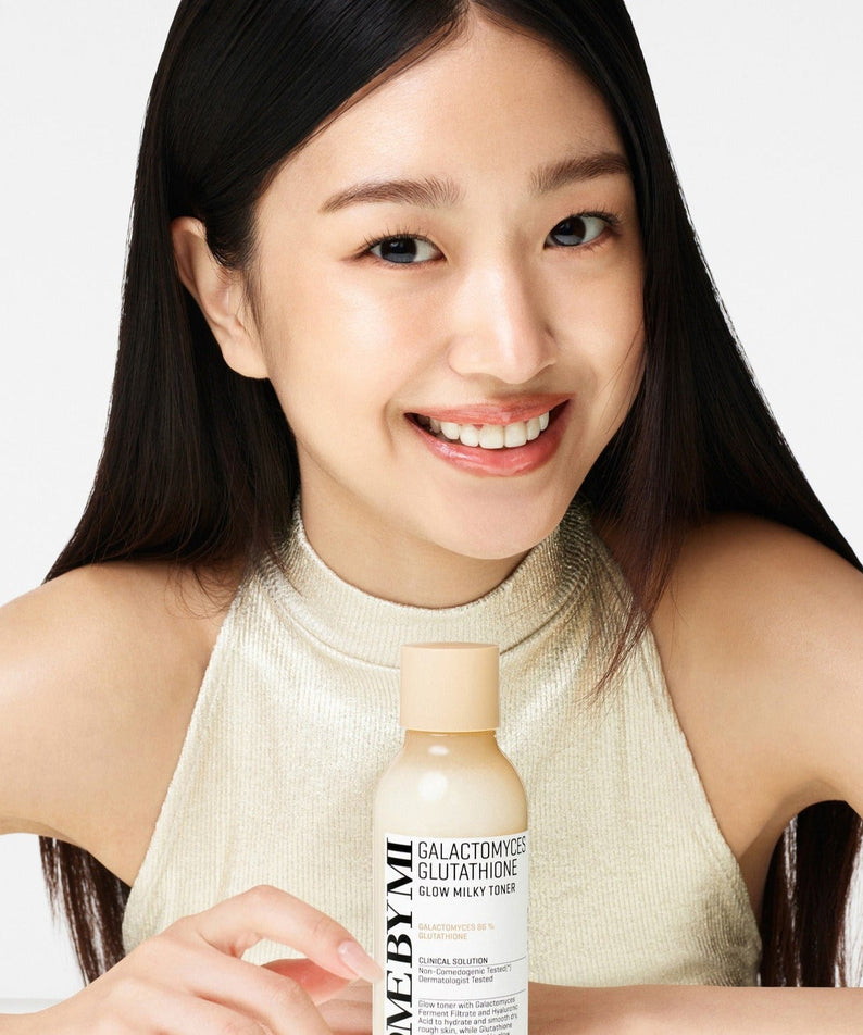 SOME BY MI Galactomyces Glutatione Glow Milky Toner 200ml held by smiling woman in creamy top