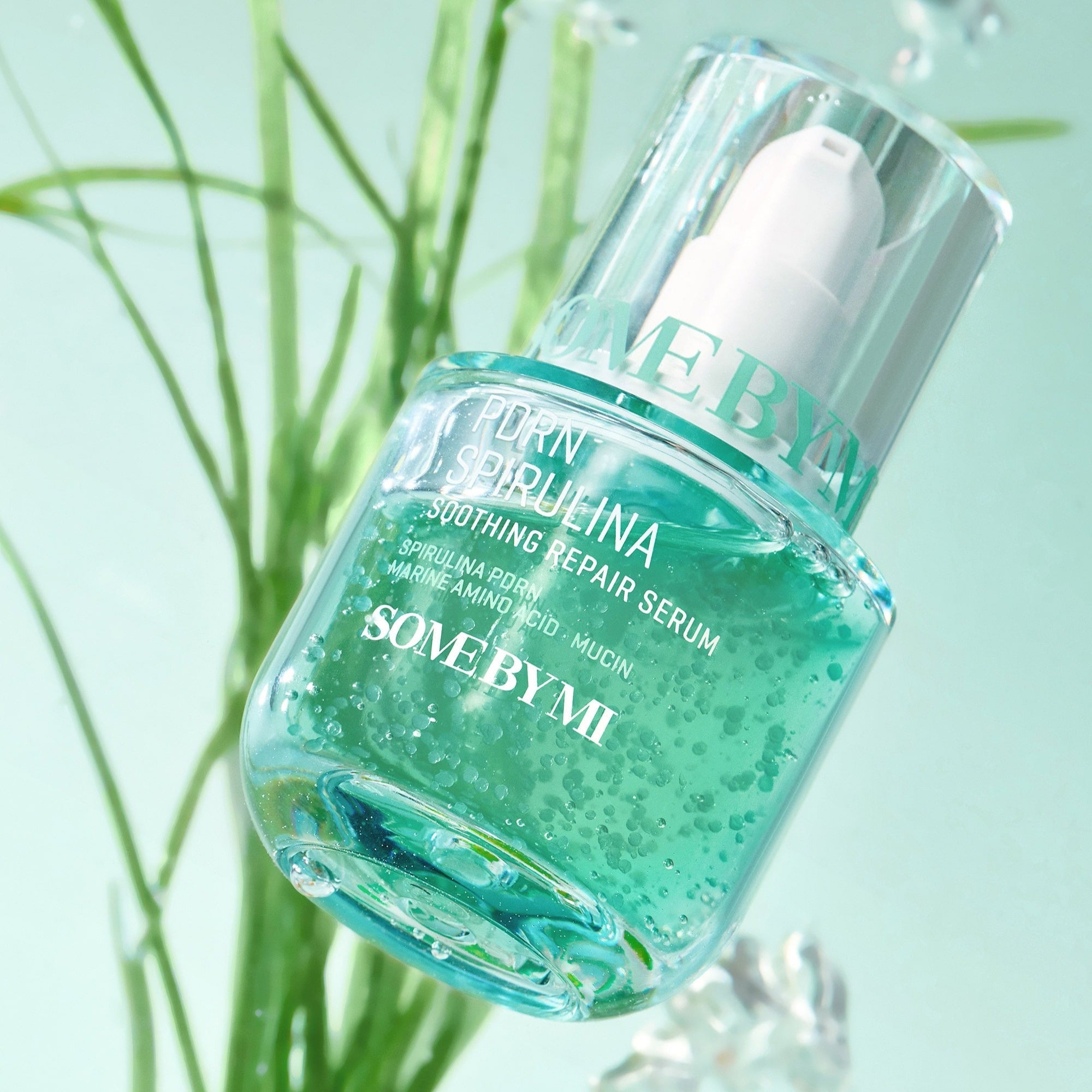 SOME BY MI PDRN Spirulina Soothing Repair Serum 50ml bottle against a nature-inspired background