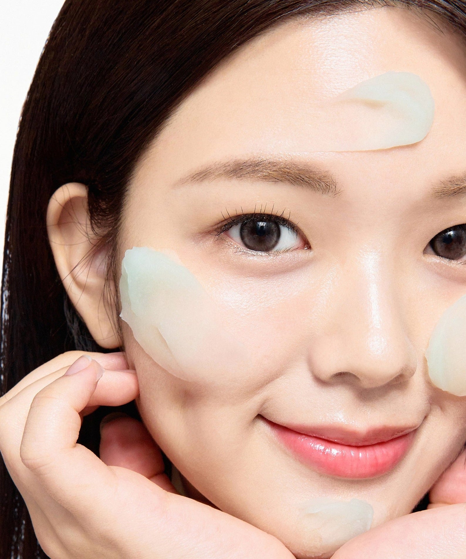 Woman applying SOME BY MI PDRN Spirulina Soothing Sherbet Mask 1g x 10ea for skincare