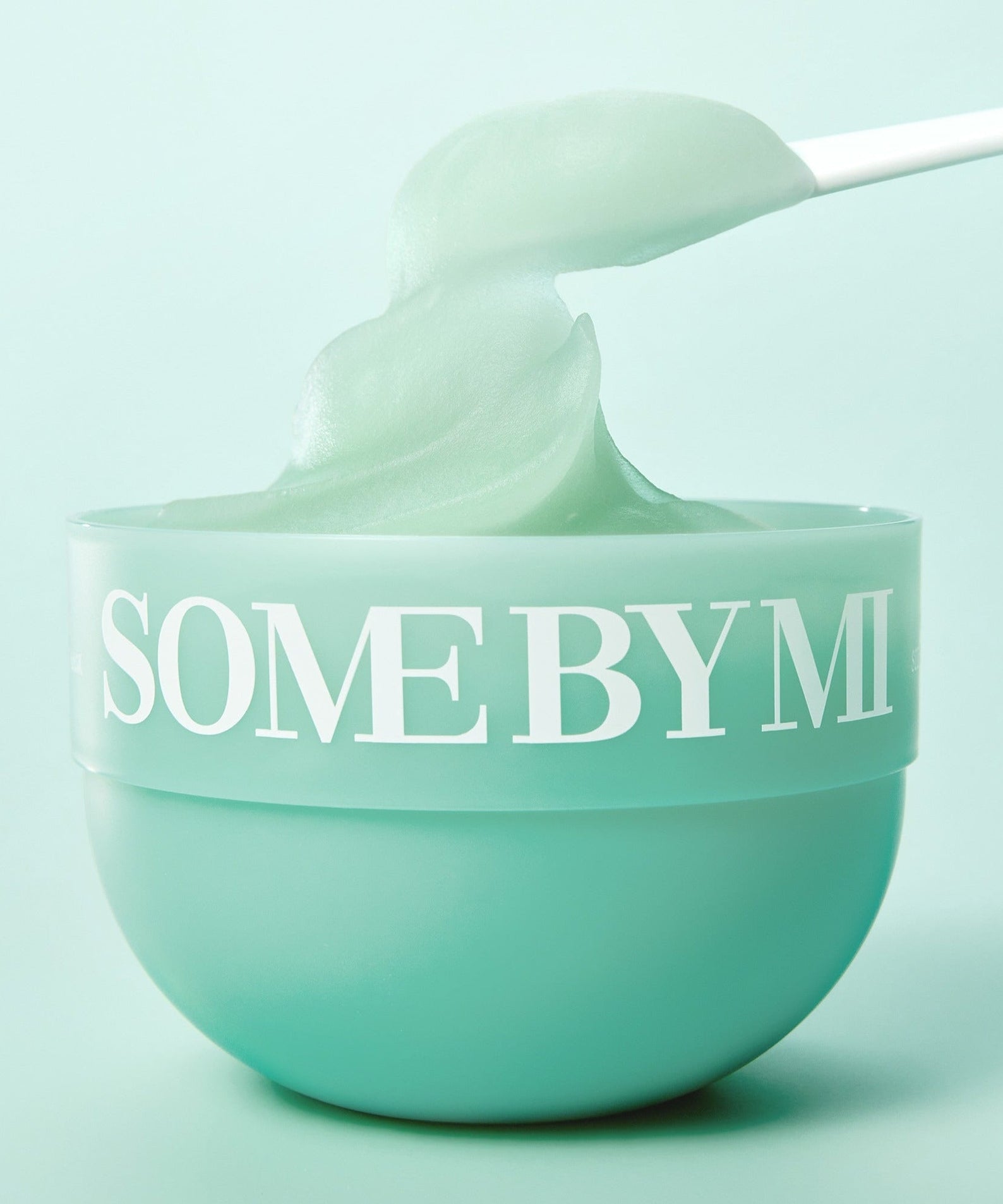 SOME BY MI PDRN Spirulina Soothing Sherbet Mask 1g x 10ea in a mint green bowl with creamy texture being scooped.