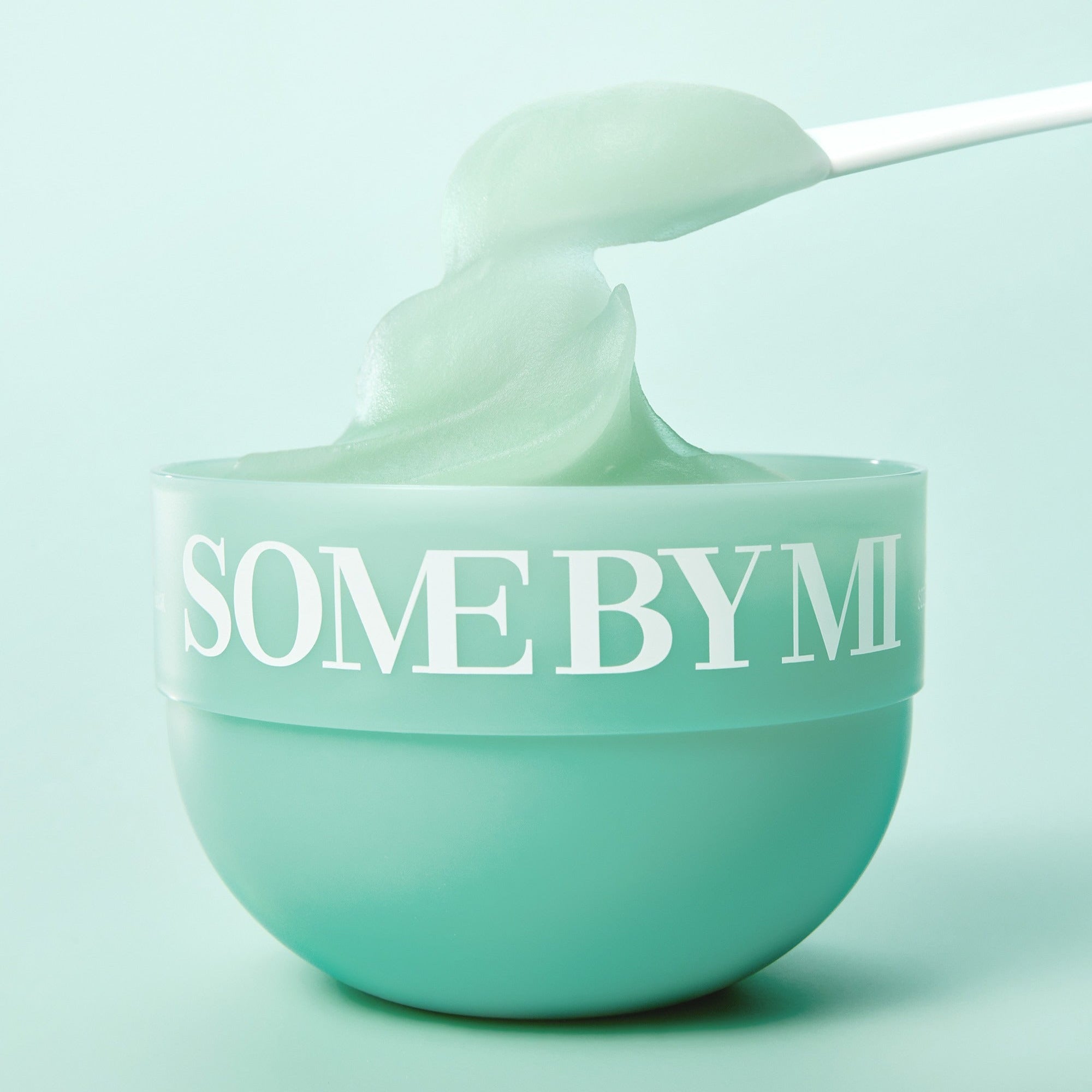 SOME BY MI PDRN Spirulina Soothing Sherbet Mask 1g x 10ea in a mint green bowl with creamy texture being scooped.