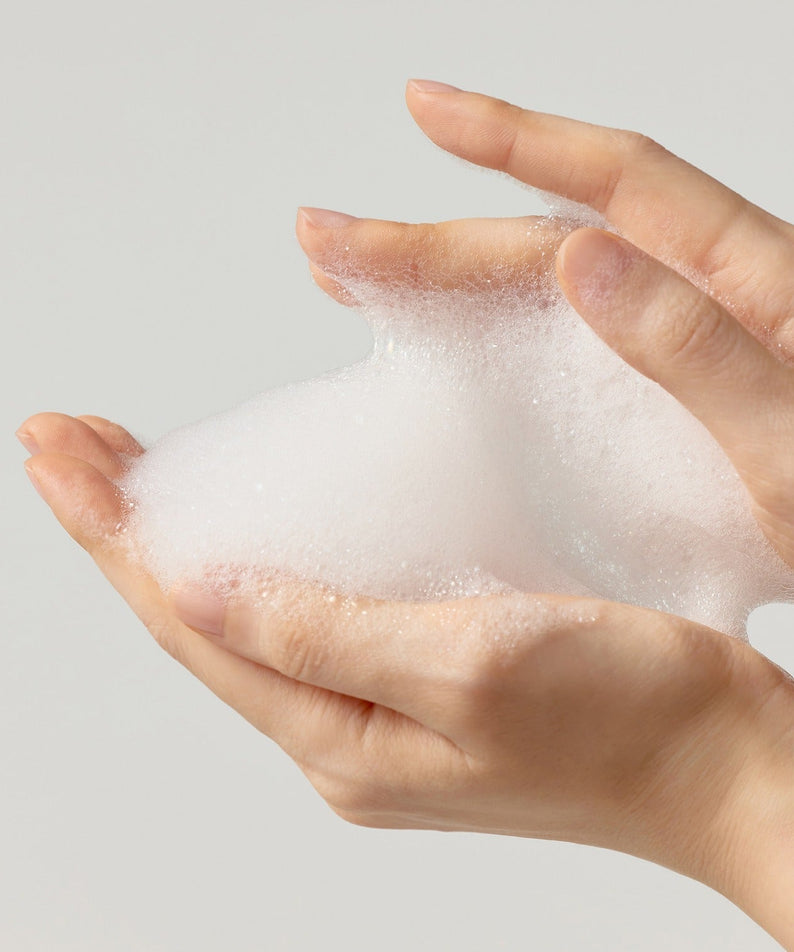 Lather of SOME BY MI Super Matcha Pore Clean Cleansing Gel 100ml in hands.