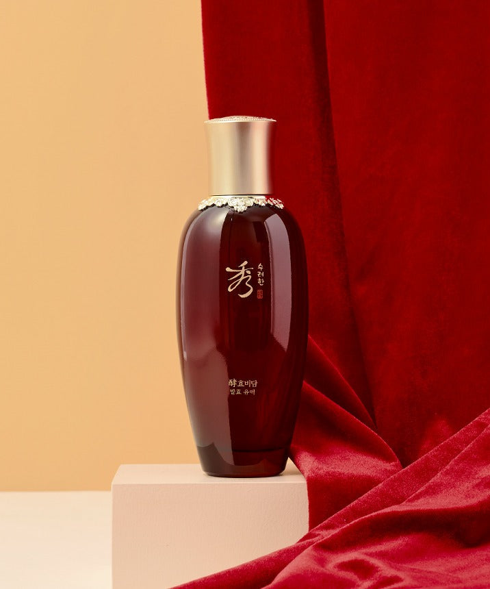 SOORYEHAN Hyobidam Fermented Milk 150ml bottle displayed on a pedestal with a red fabric background.
