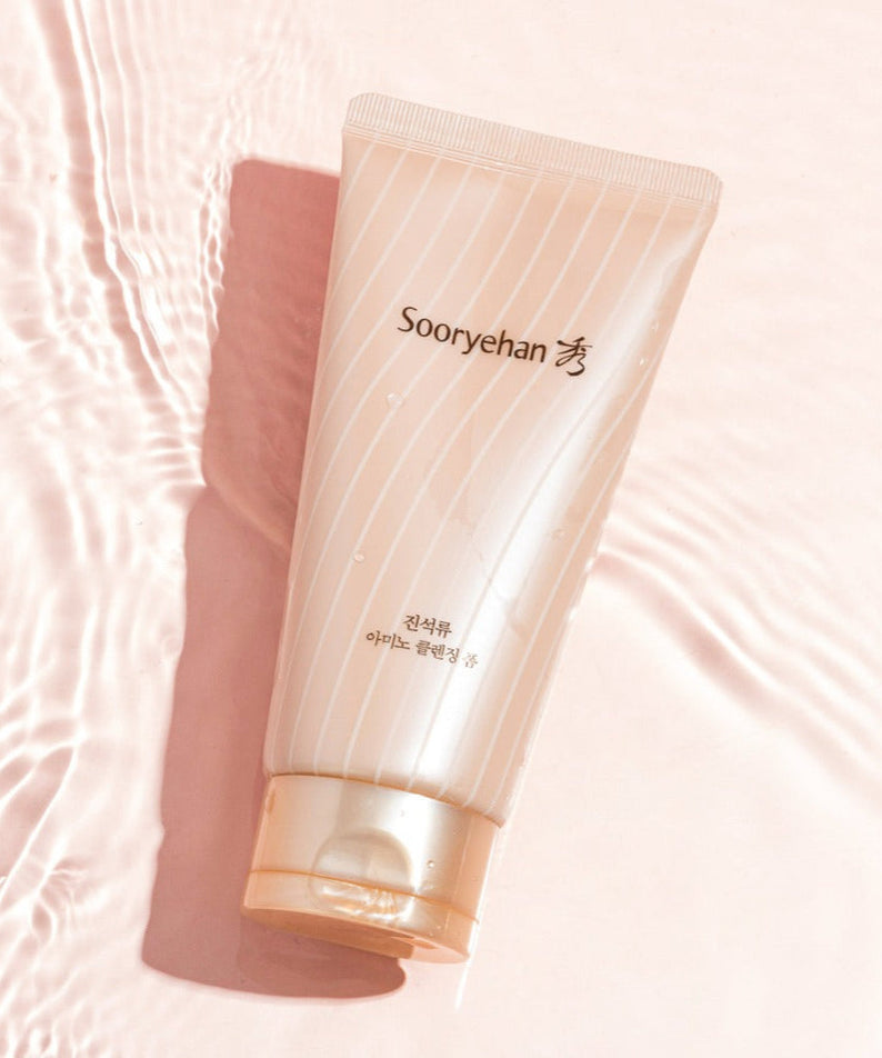 SOORYEHAN Jinseokryu Amino Cleansing Foam 160ml tube on a pink background illustrating skincare product packaging