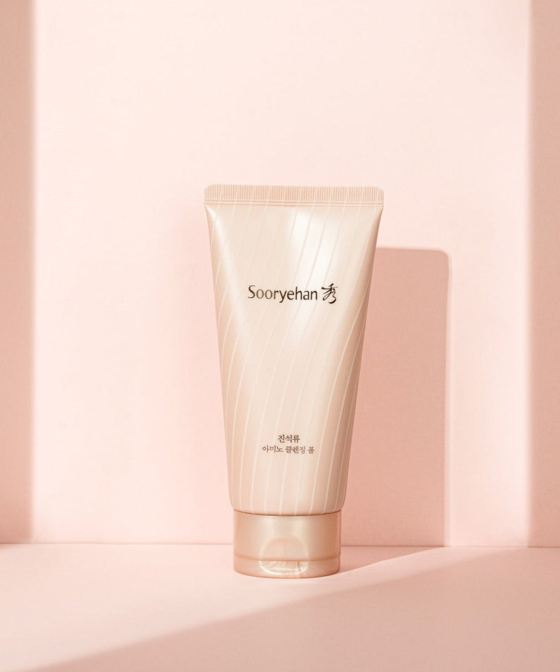 SOORYEHAN Jinseokryu Amino Cleansing Foam 160ml in elegant packaging against a soft pink background