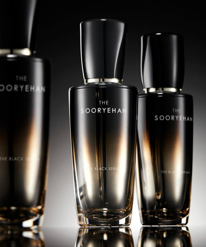 SOORYEHAN The Black Serum 30ml bottles in sleek design with elegant black and gold packaging on display.