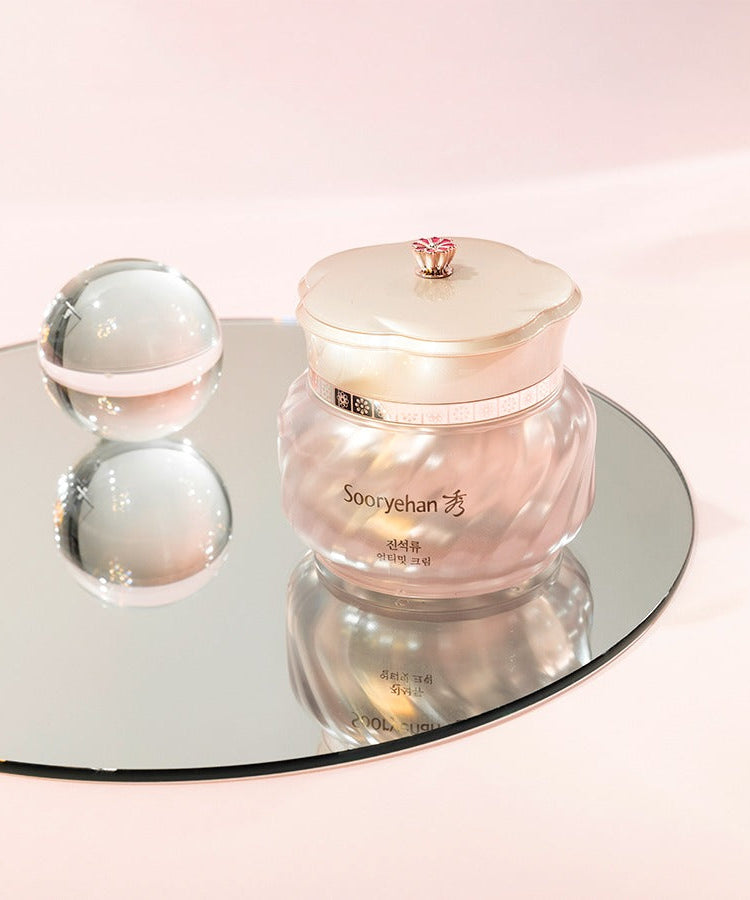 SOORYEHAN Ultimate Cream 50ml displayed on a reflective surface with elegant packaging design.