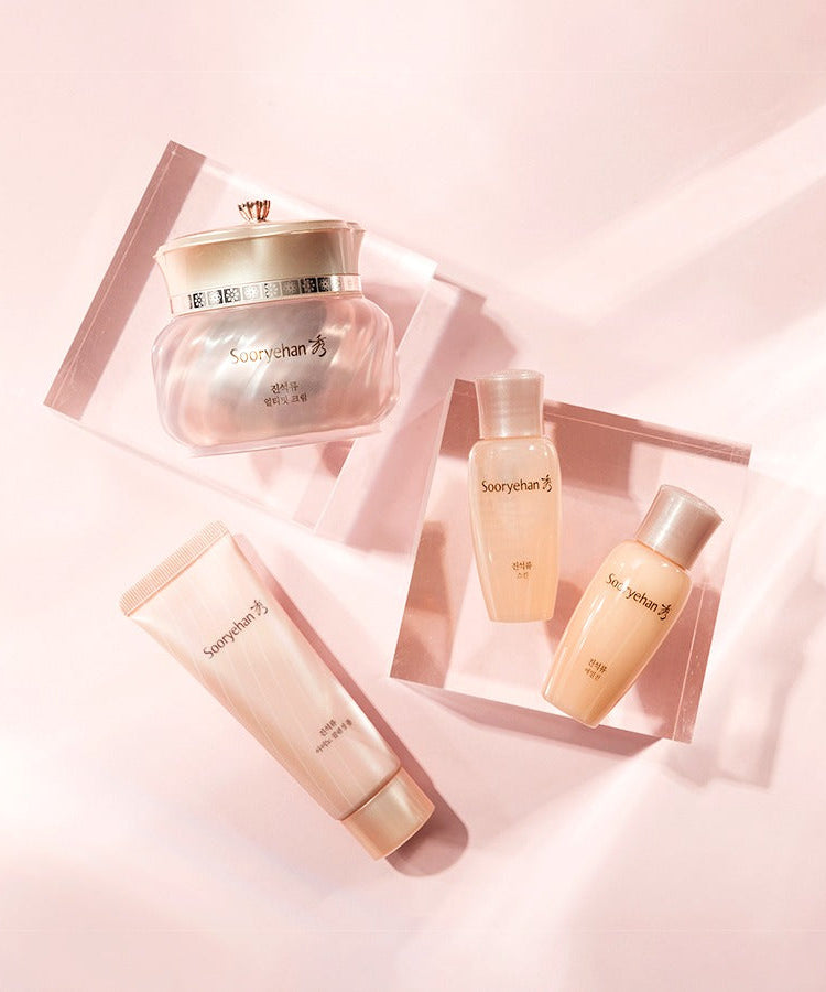 SOORYEHAN Ultimate Cream 50ml and skincare set on a pink background.