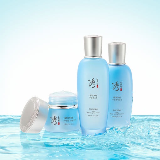 SOORYEHAN Hyobidam Jeongyul Lotion 130ml with a serene blue packaging, displayed elegantly with other skincare products on a water backdrop.