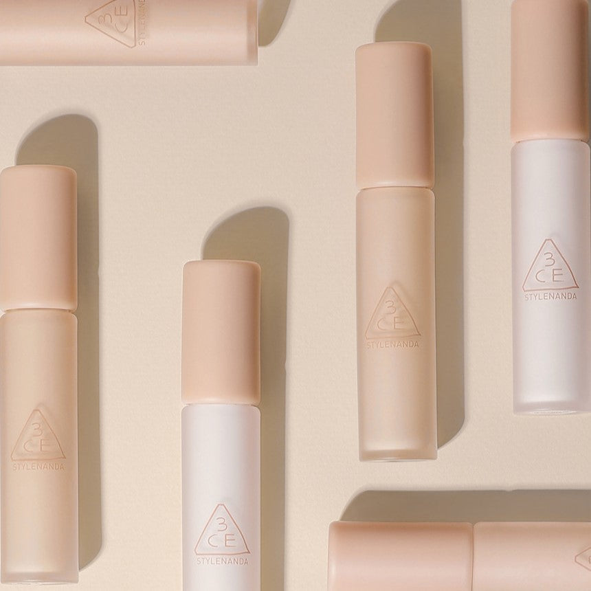STYLE NANDA 3CE Skin Fit Cover Liquid Concealer bottles arranged on a neutral background showing product design and branding.
