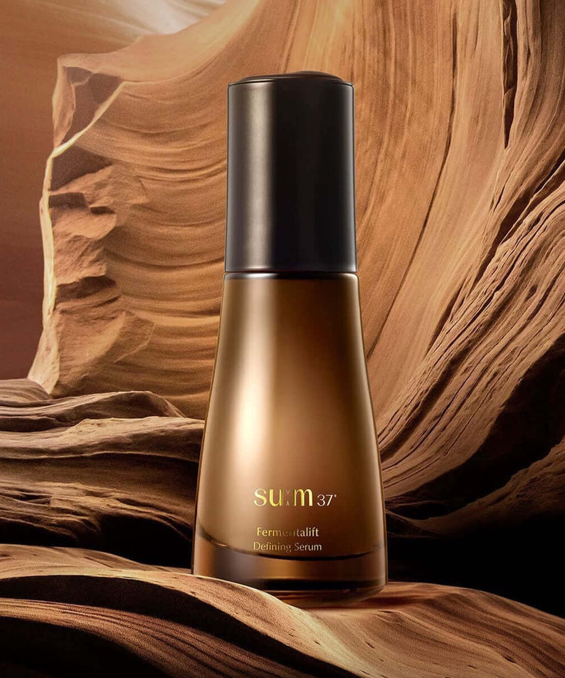 SU:M37 Fermentalift Defining Serum 50ml bottle with artistic background