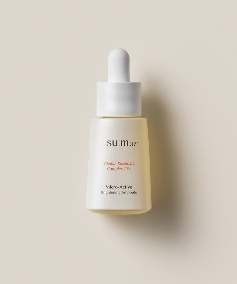 SU:M37 Microactive Brightening Ampoule 15ml product bottle on a neutral background.