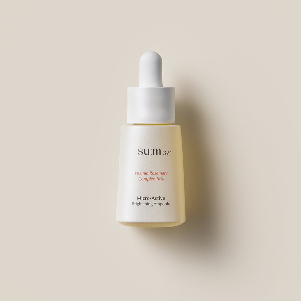 SU:M37 Microactive Brightening Ampoule 15ml product bottle on a neutral background.