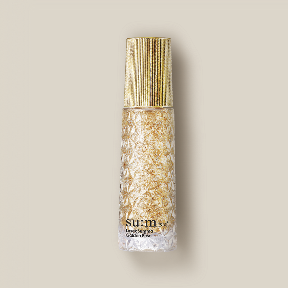 Bottle of SU:M37 Rosicsumma Golden Base 30ml with golden lid and intricate design.