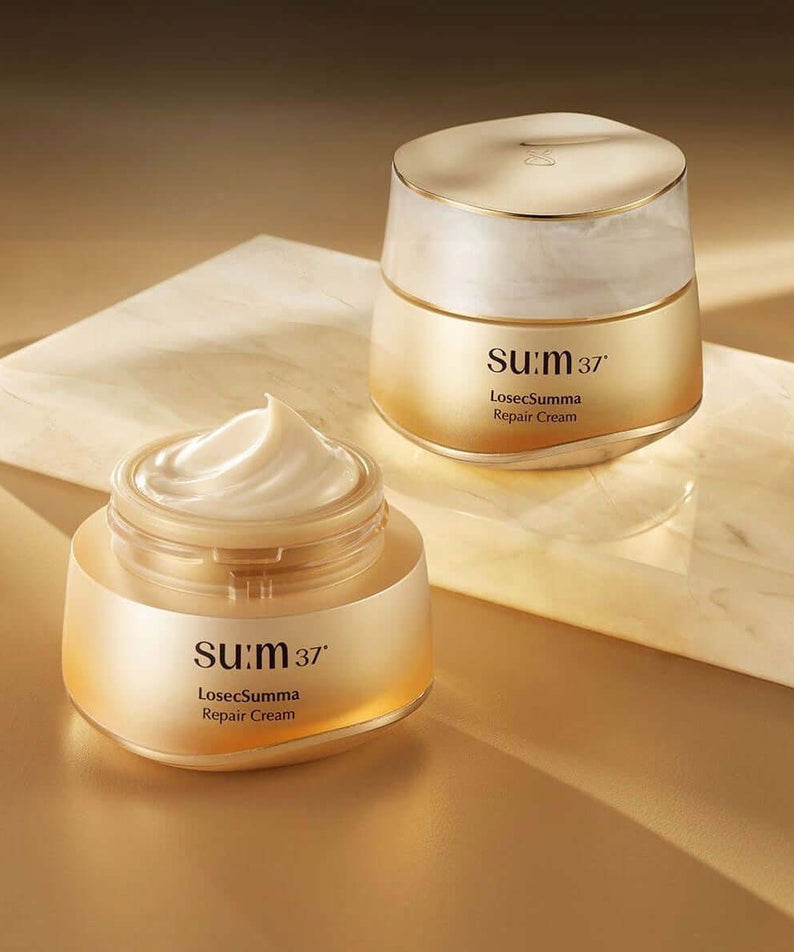 SU:M37 Rosicsumma Repair Cream 50ml displayed elegantly on a marble surface