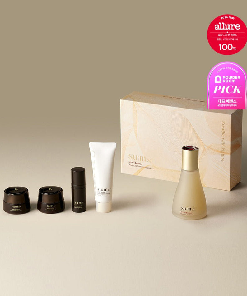 SU:M37 Secret Essence 80ml Set featuring skincare products with elegant packaging and award badges.