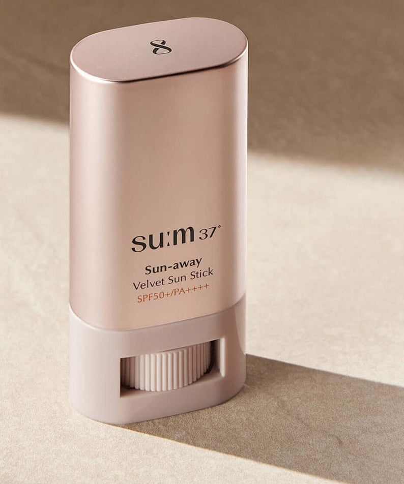 SU:M37 Sun-Away Velvet Sun Stick 18g on a neutral background.
