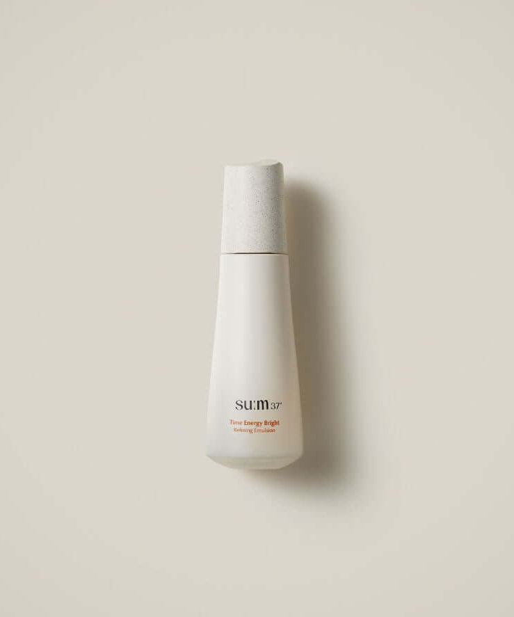 Image of SU:M37 Time Energy Bright Refining Emulsion 120ml bottle against a light background.