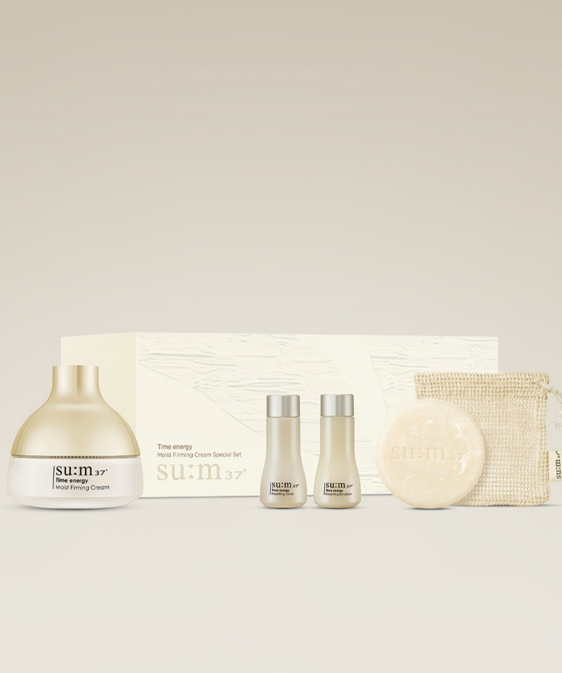 Image of SU:M37 Time Energy Cream Planning with complete skincare set including cream, serum, and bar soap on display.