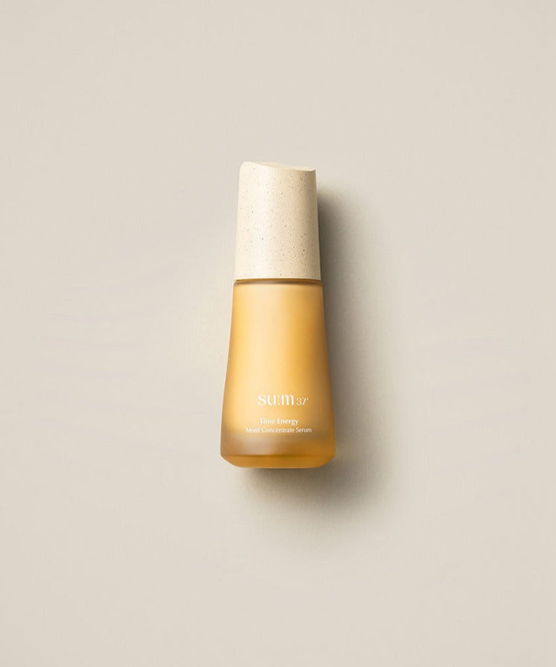 SU:M37 Time Energy Moist Concentrate Serum 50ml bottle on a beige background