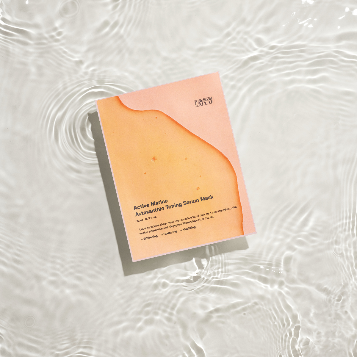 SUNGBOON EDITOR Active Marine Asxatanthin Toning Serum Mask 10 Sheets product packaging on water surface