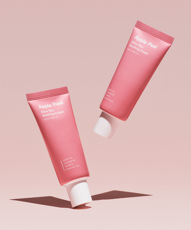 SUNGBOON EDITOR Apple Peel Glow Skin Soothing Cream 50ml tubes against a pink background.